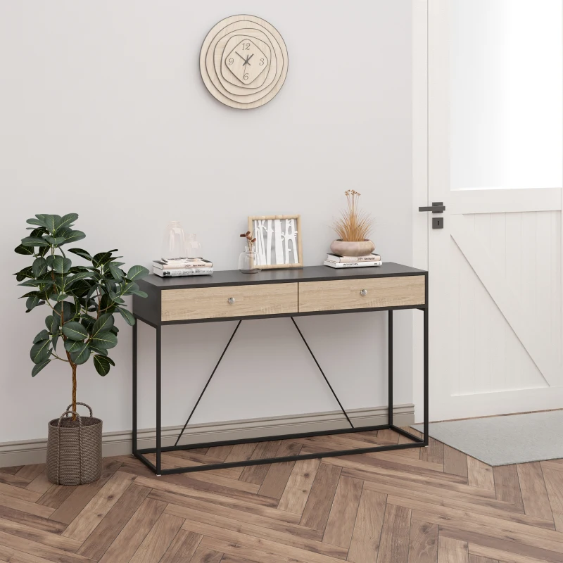 Table console moderne avec tiroirs en bois clair et structure en métal dans une pièce contemporaine.