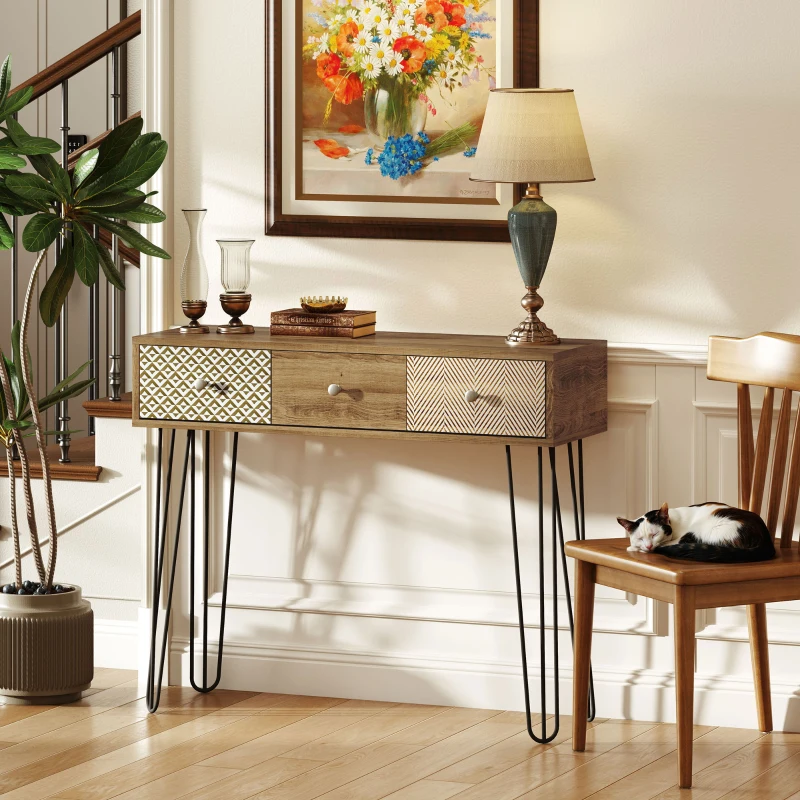 Console étroite en bois avec une structure en métal noir et des tiroirs, placée contre un mur blanc.