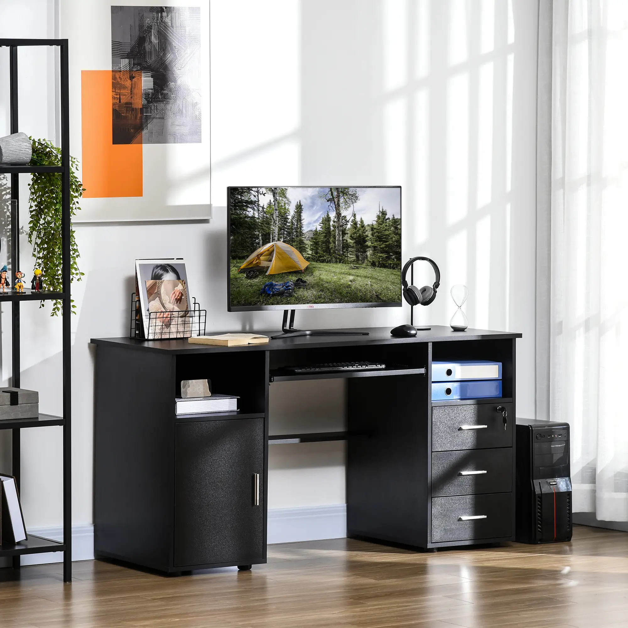 Bureau d'ordinateur noir avec tiroirs de rangement et emplacement pour moniteur.