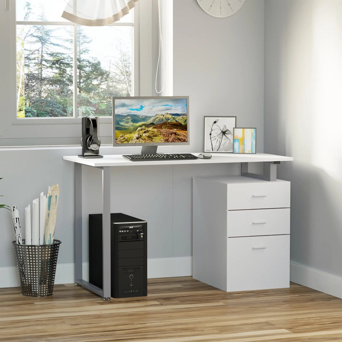 White desk with drawers, computer, and window view.