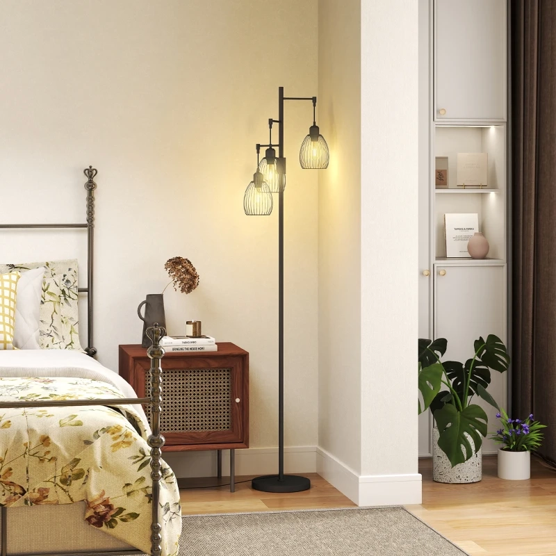 Floor lamp next to bed and wooden nightstand with books and dÃ©cor.