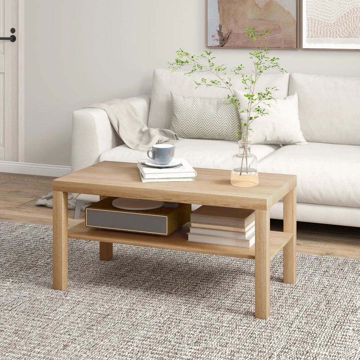 Table basse rectangulaire simple en bois avec une étagère inférieure contenant des livres et une boîte de rangement.