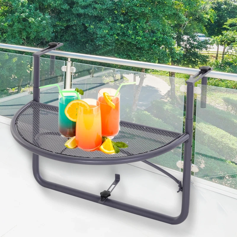Table pliante semi-circulaire de balcon avec trois boissons colorées et des garnitures de fruits sur le dessus.